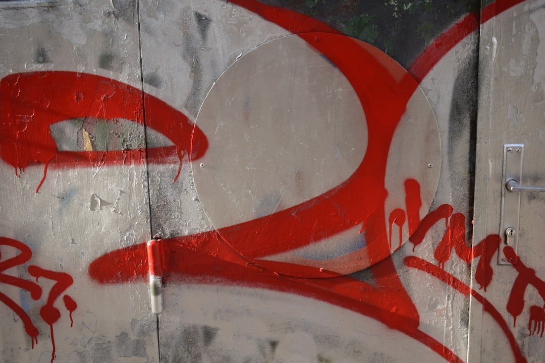a wall with some graffiti on it