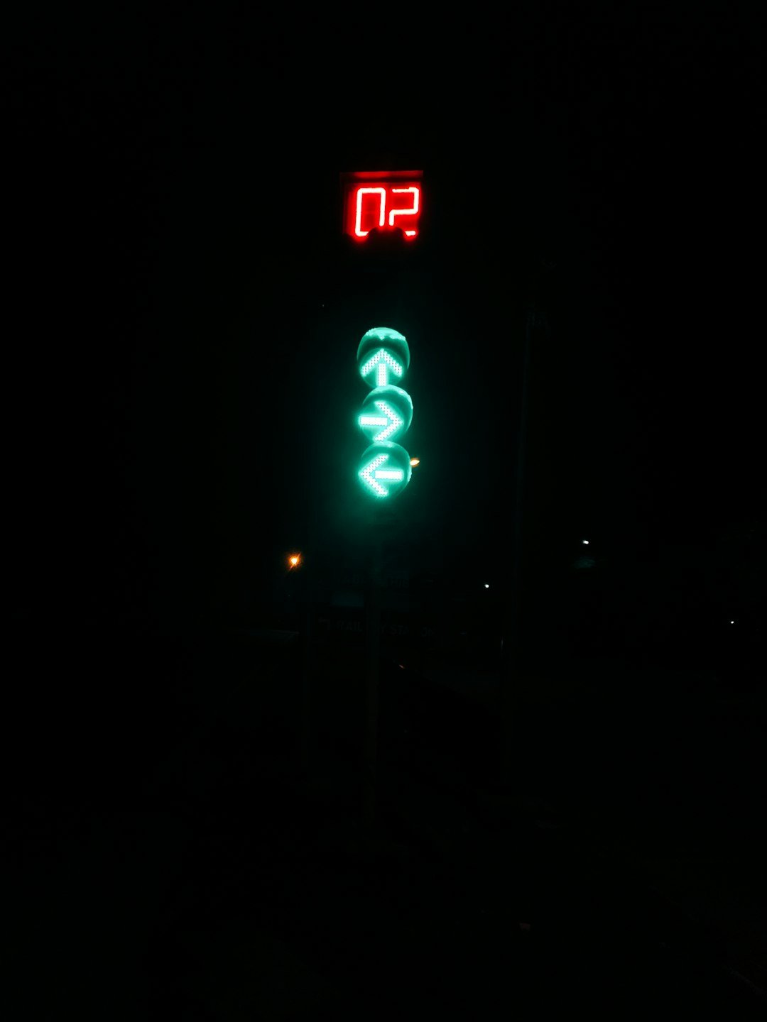 green and red stop sign