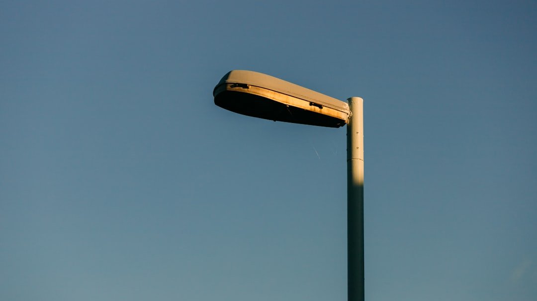a light post with a yellow object on top