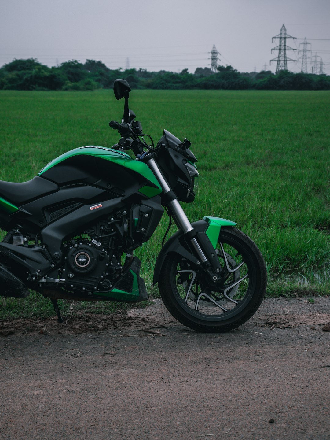 a motorcycle parked on the side of a road