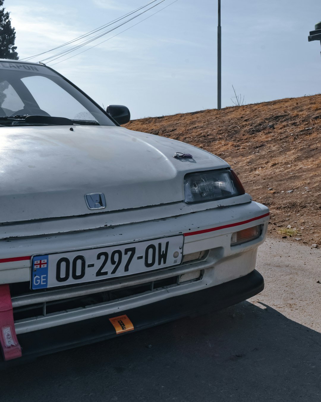 the front of a white car