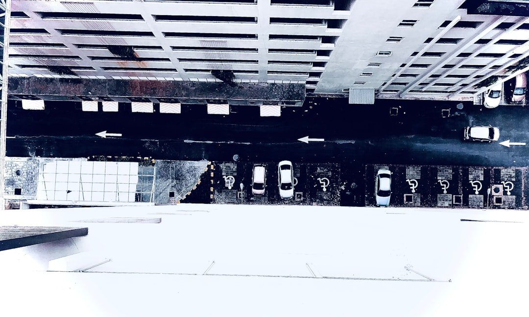 a black and white photo of a parking garage
