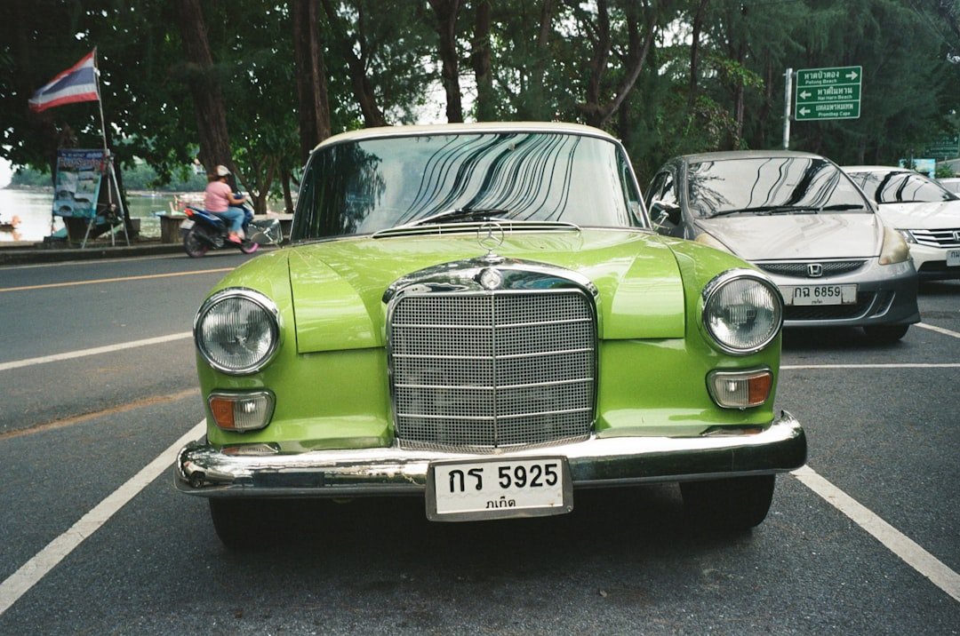 a green car on the street