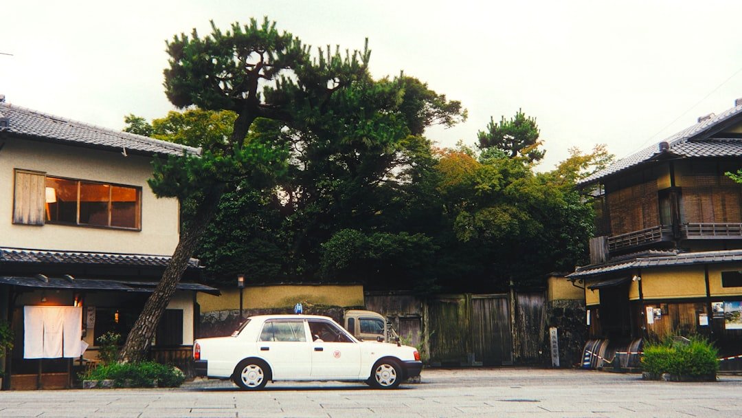 a white truck parked in front of a building