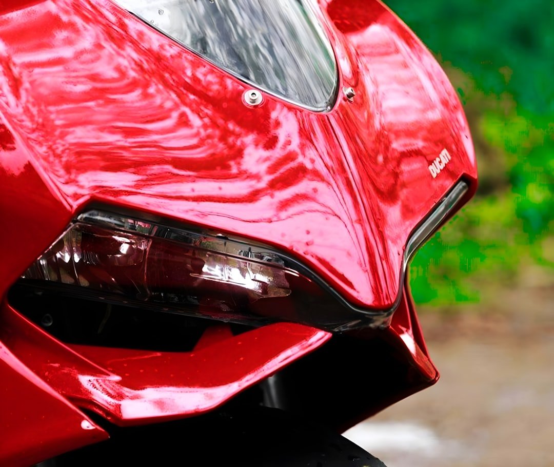 a close up of a red sports car