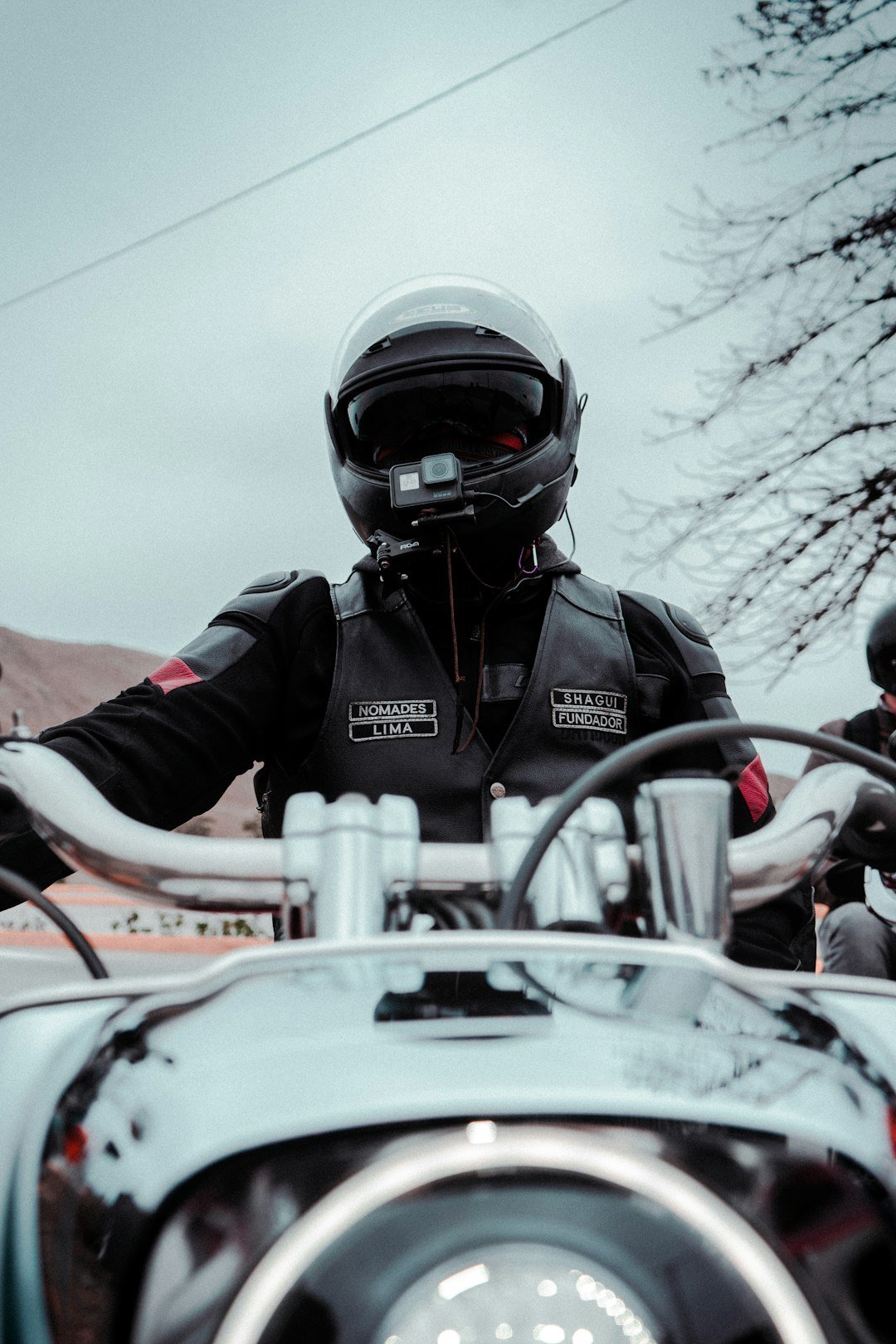 a man in a helmet is riding a motorcycle