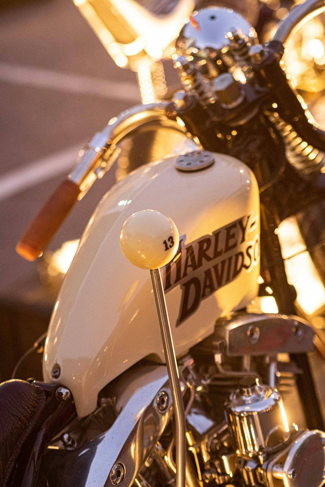 A harley davidson motorcycle parked in a parking lot