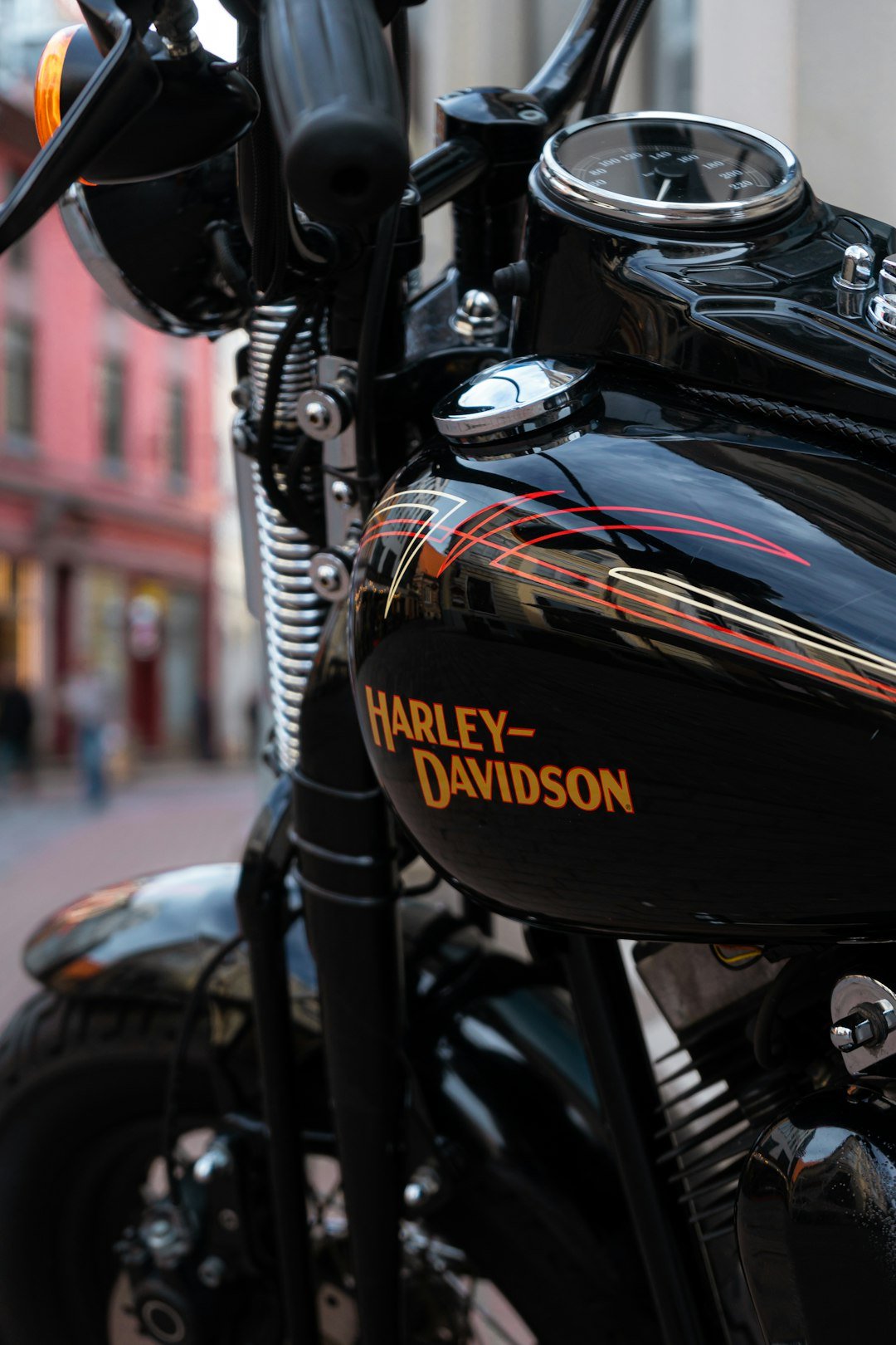 a harley davidson motorcycle parked on a city street