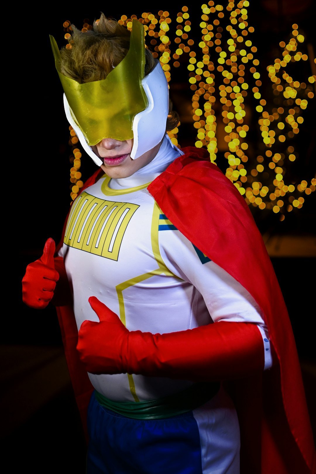 a man dressed as a super hero in a costume