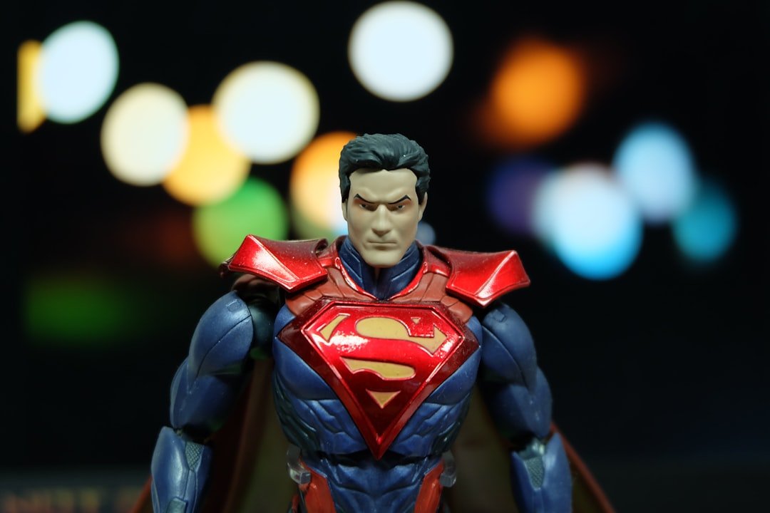 a close up of a superman action figure