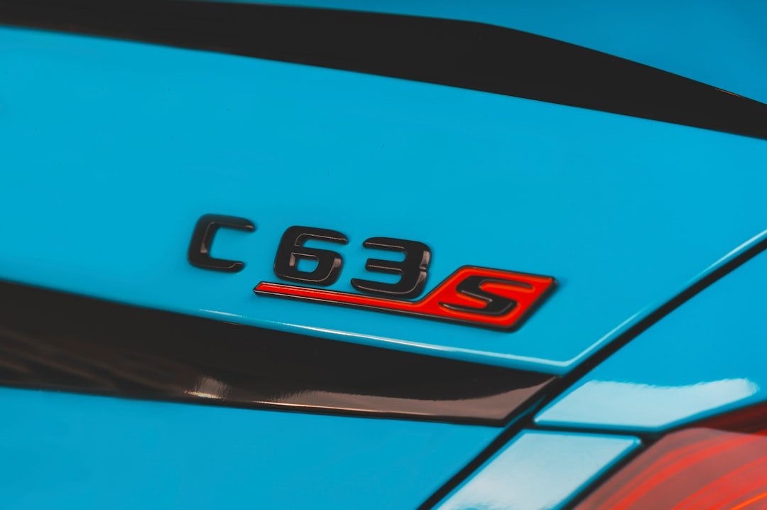a close up of the emblem on a blue car