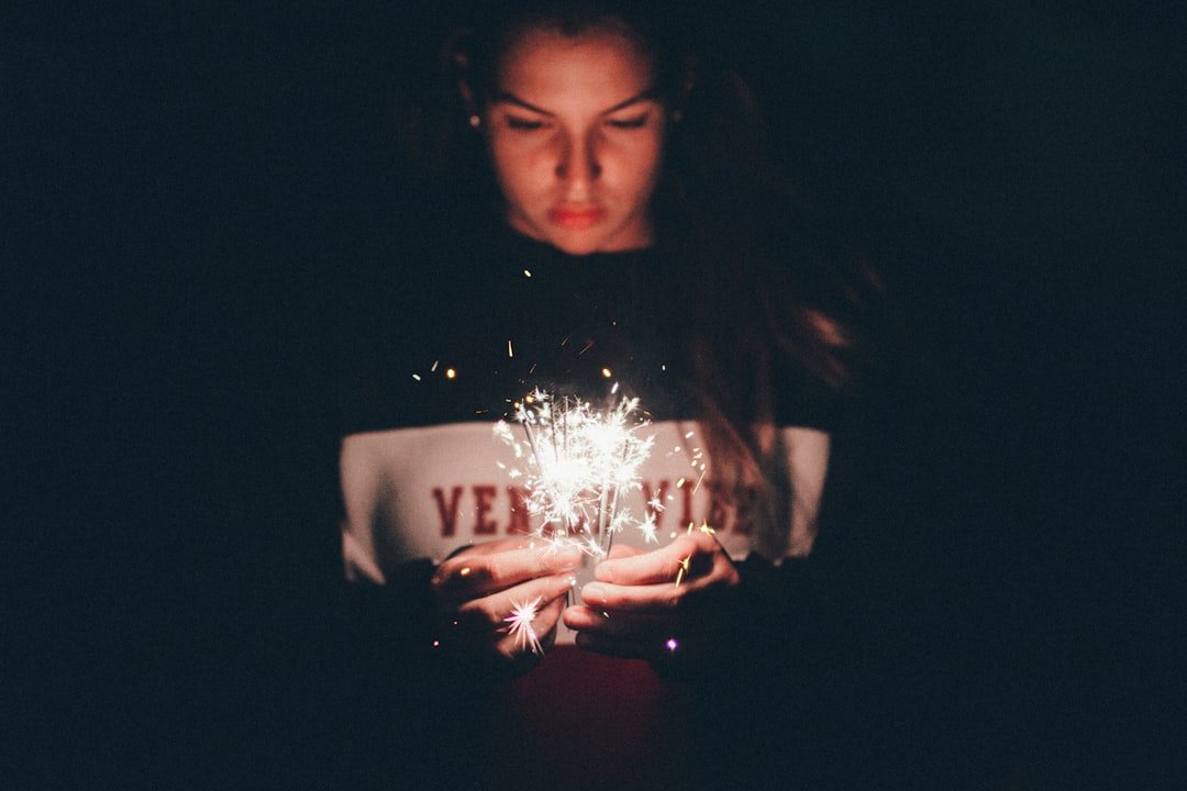 woman holding sparkler