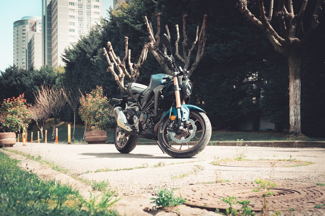 a motorcycle parked on the side of a road