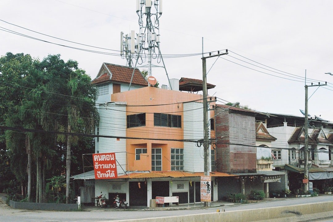 A street corner with a building on the corner
