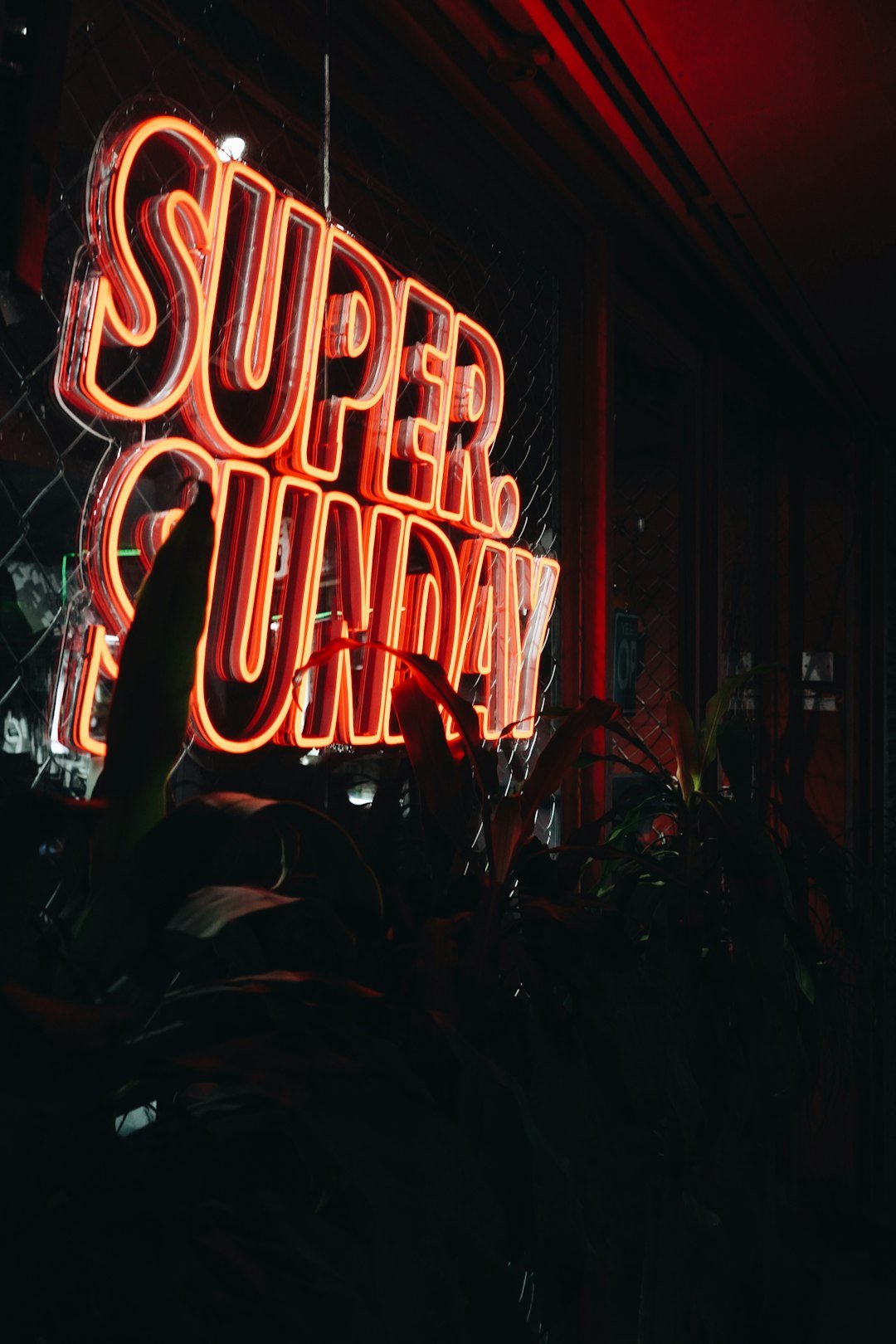 red and yellow neon light signage