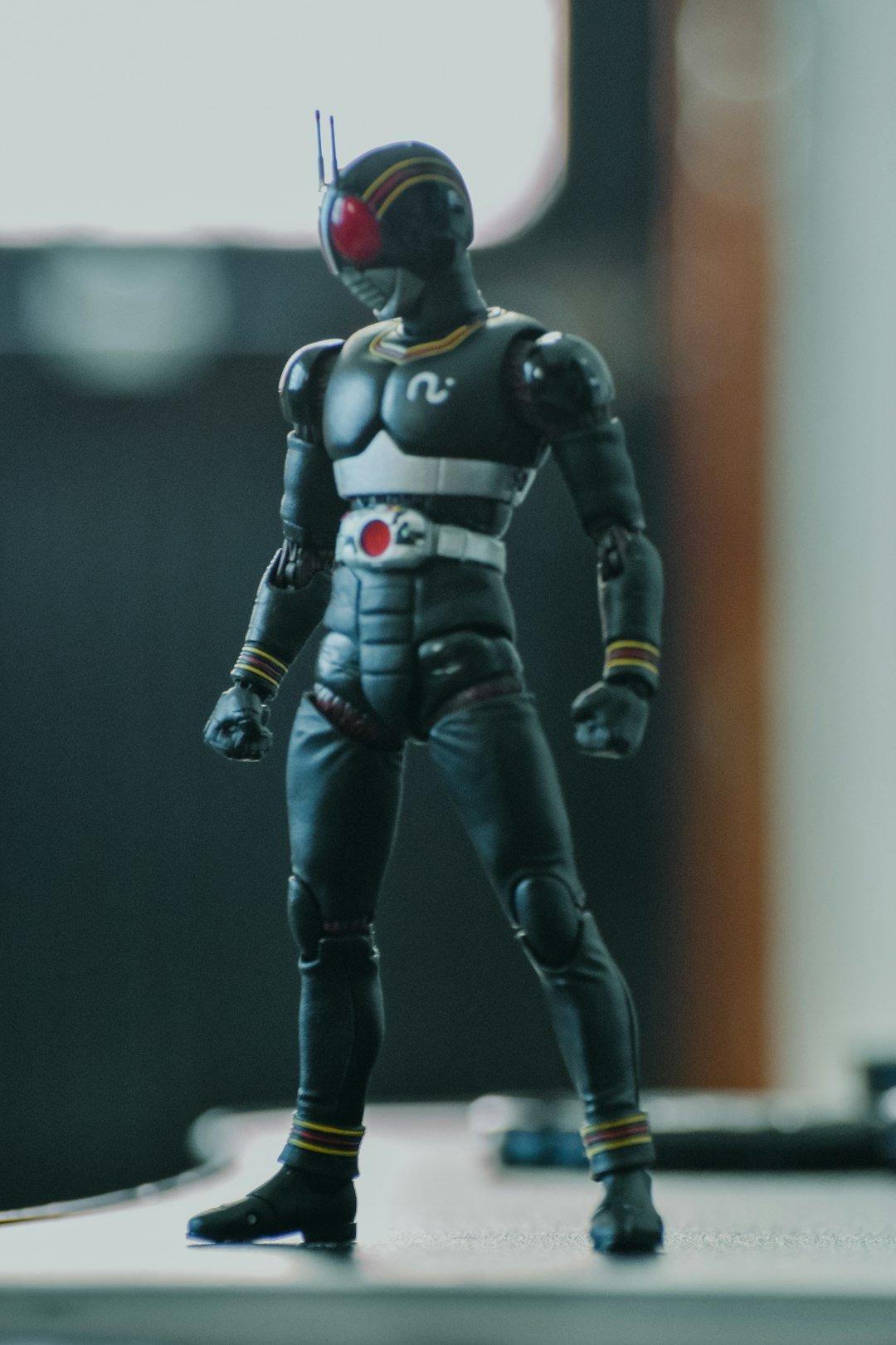 A close up of a toy figure on a table