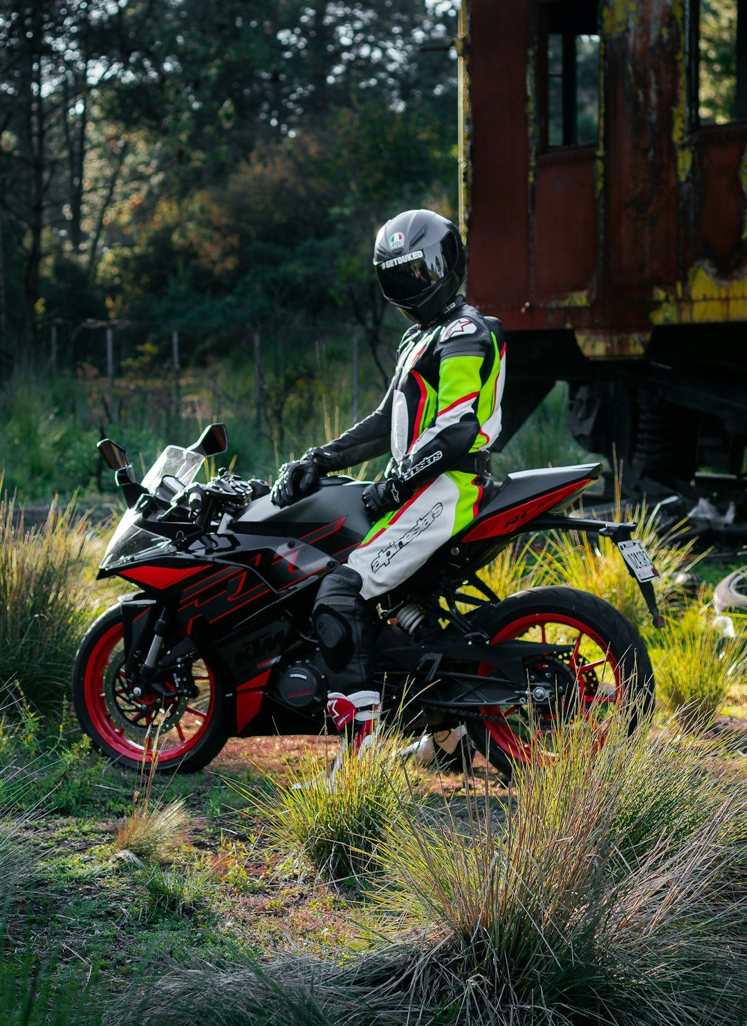 a person on a motorcycle in a field