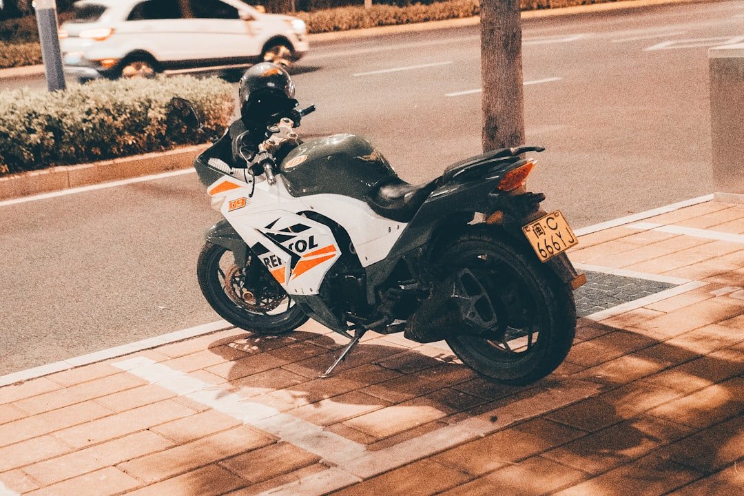 A motorcycle parked on the side of the road