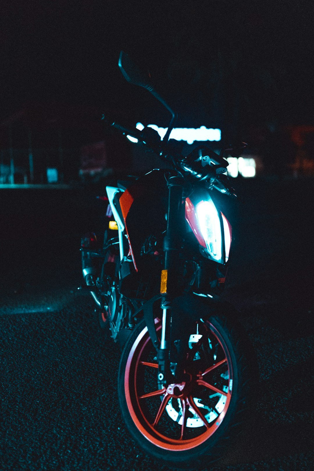 black and yellow motorcycle on road during night time