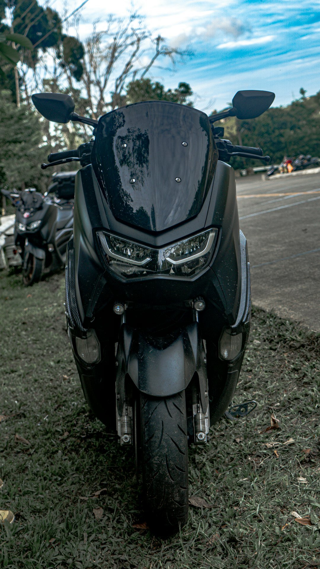 a motorcycle parked on the side of the road