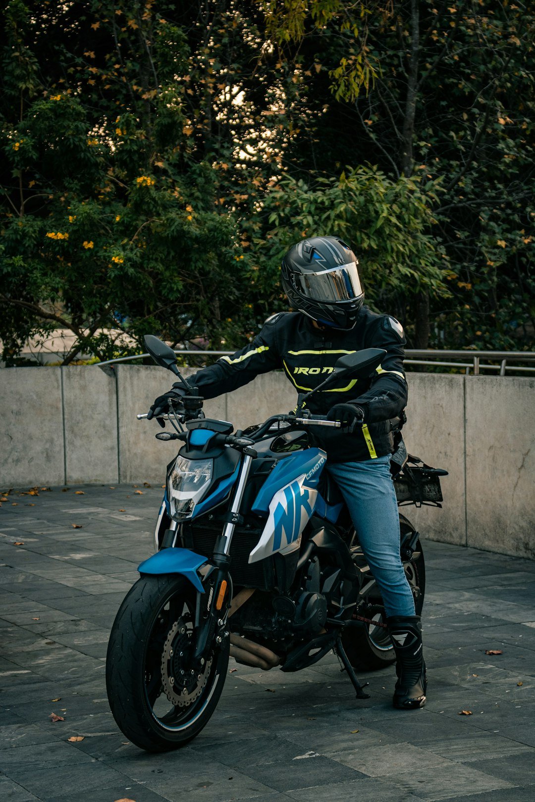 a person on a motorcycle with a helmet on