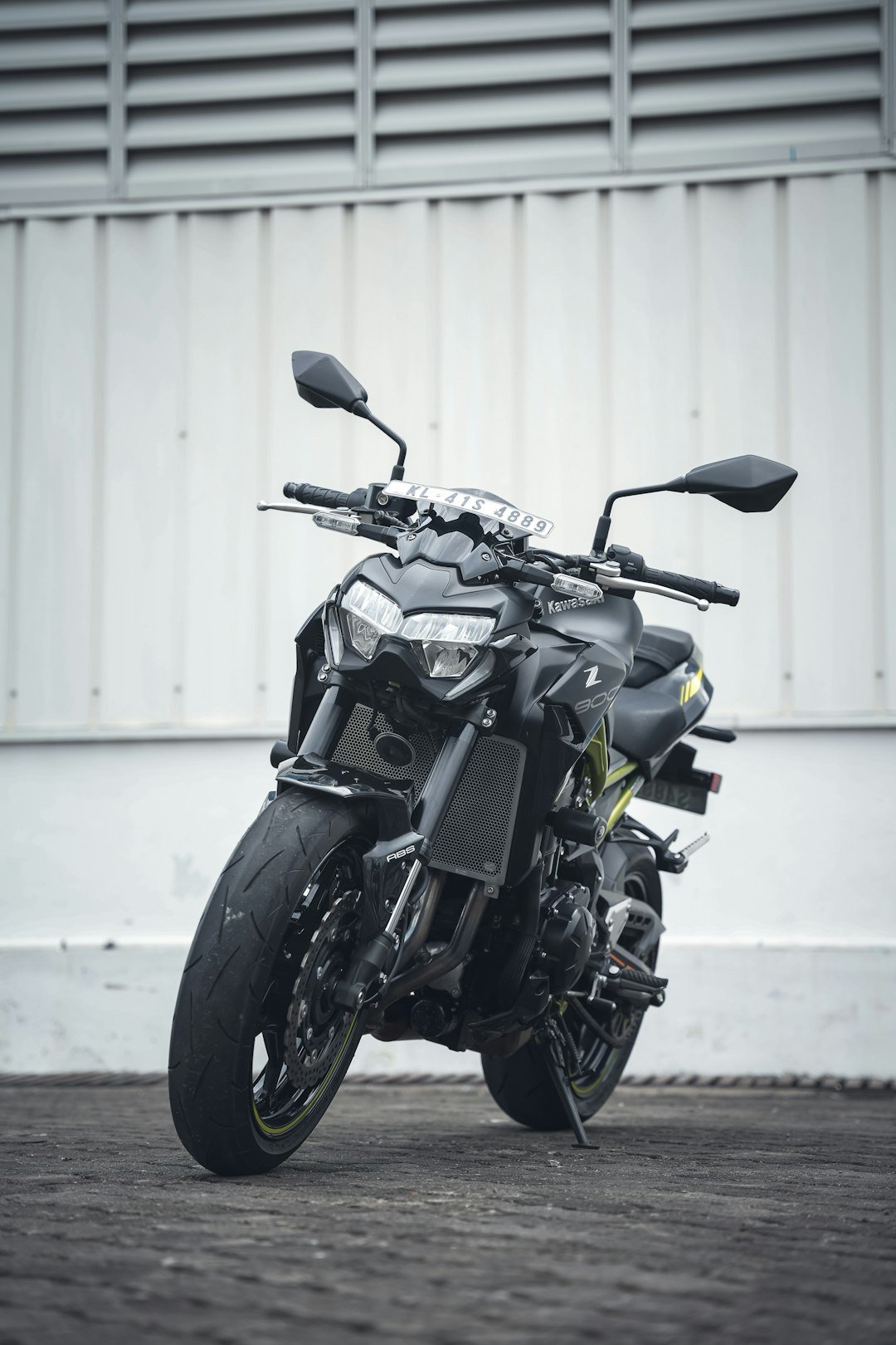 a motorcycle parked in front of a building