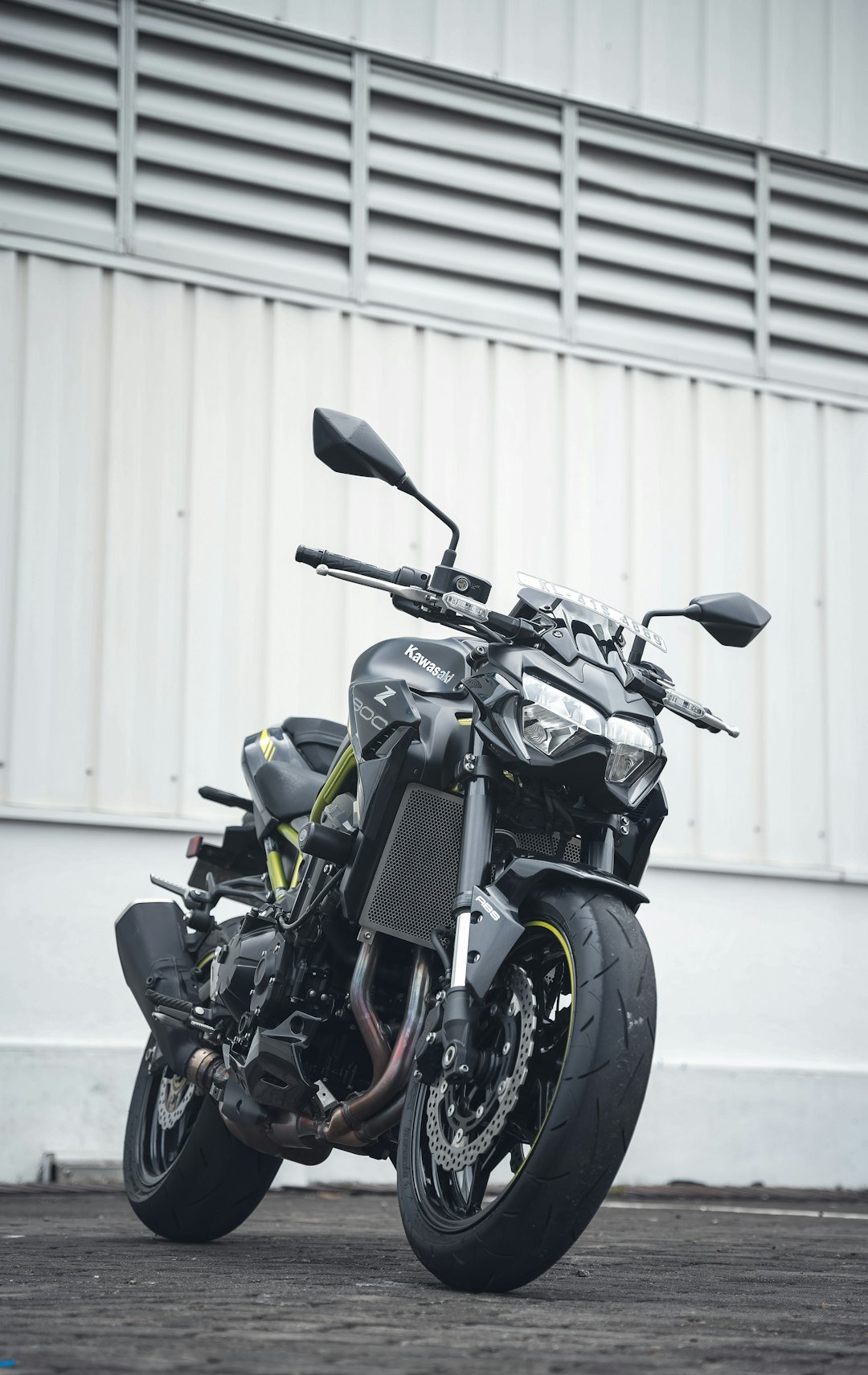 a motorcycle parked in front of a garage