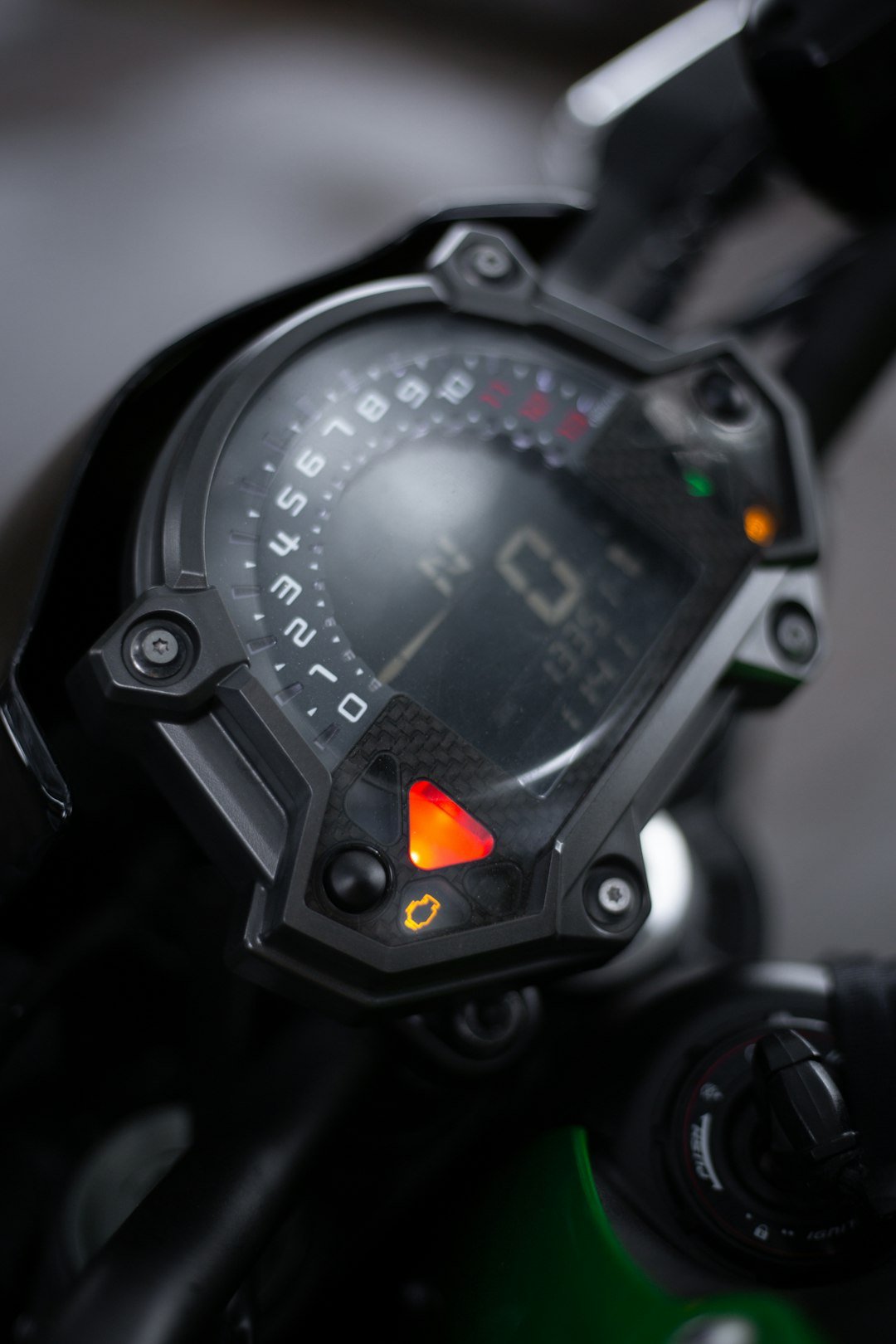 a close up of a speedometer on a motorcycle