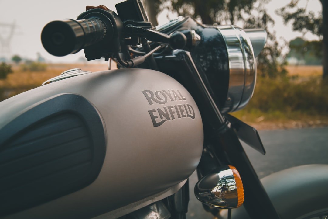 black and gray Royal Enfield cruiser bike