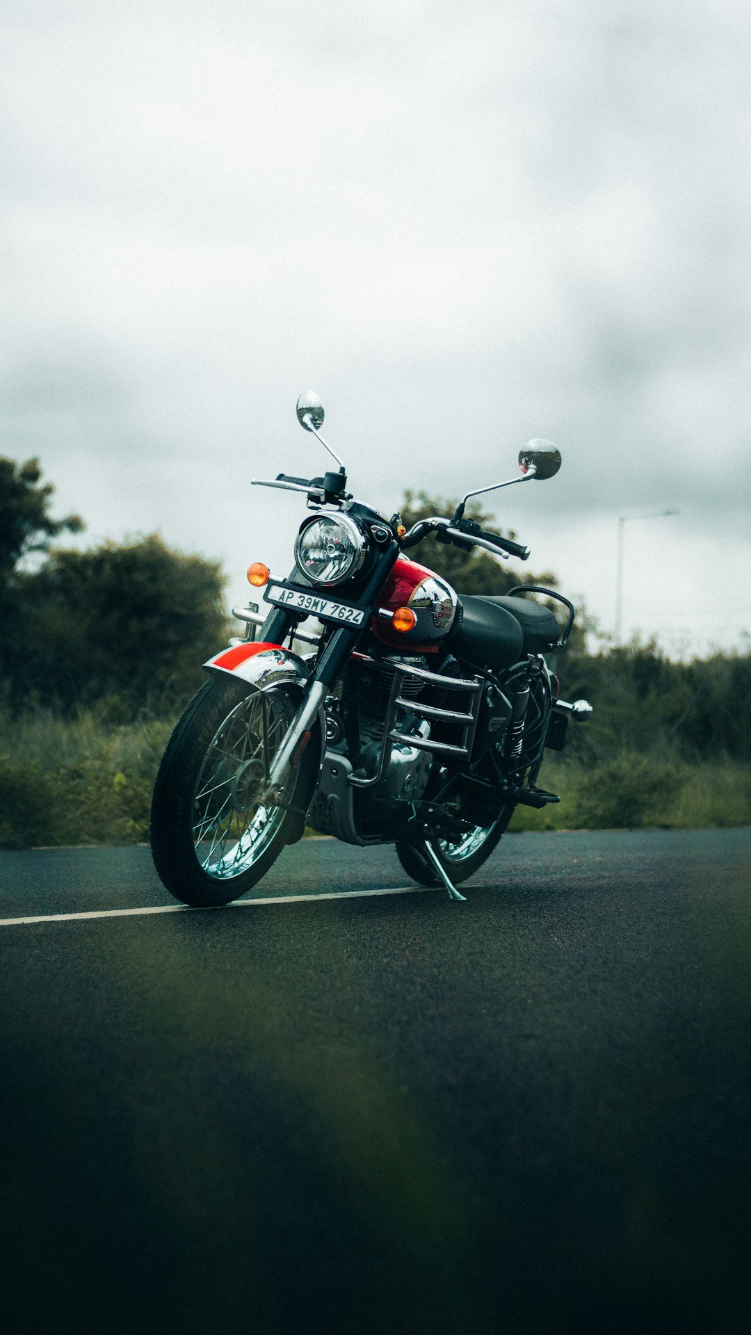 a motorcycle parked on the side of a road