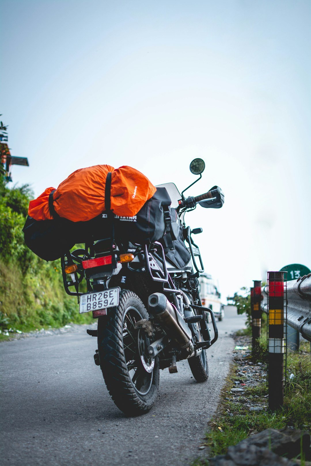 A motorcycle parked on the side of a road