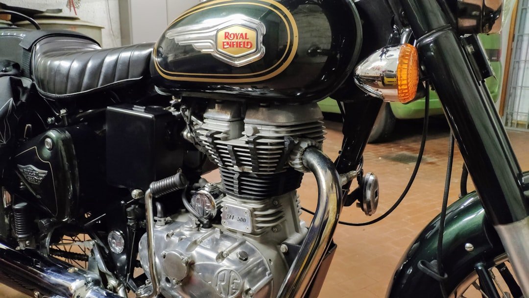 a close up of a motorcycle parked in a garage