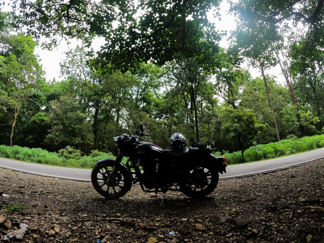 a motorcycle parked on the side of a road