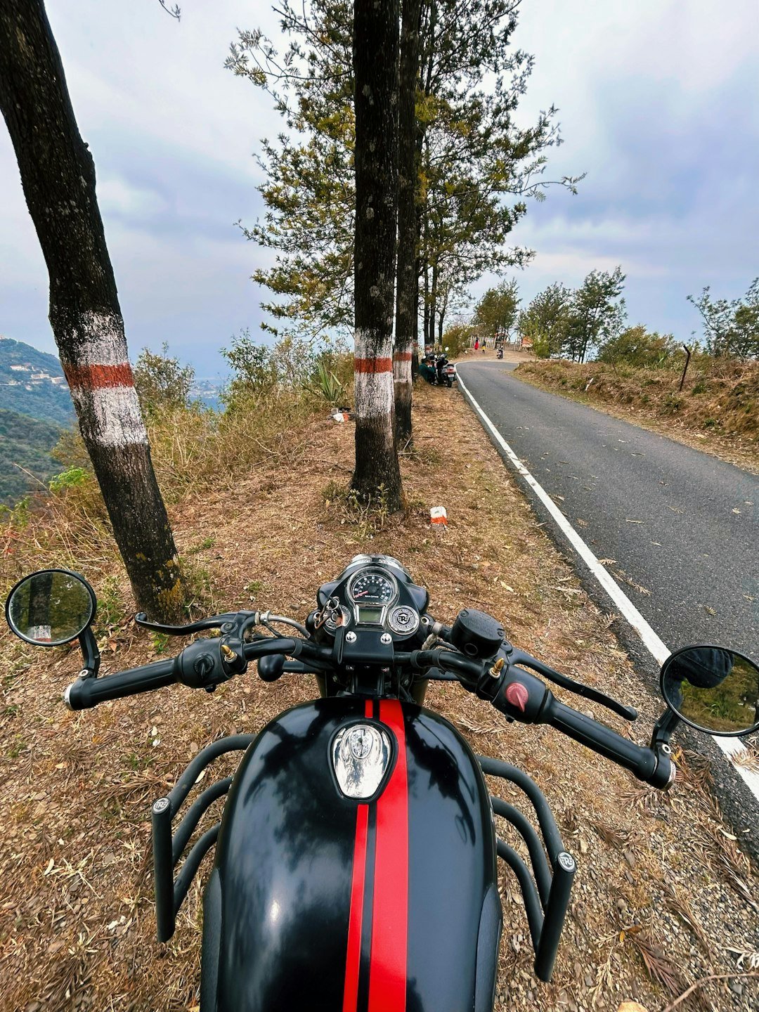 a motorcycle parked on the side of a road