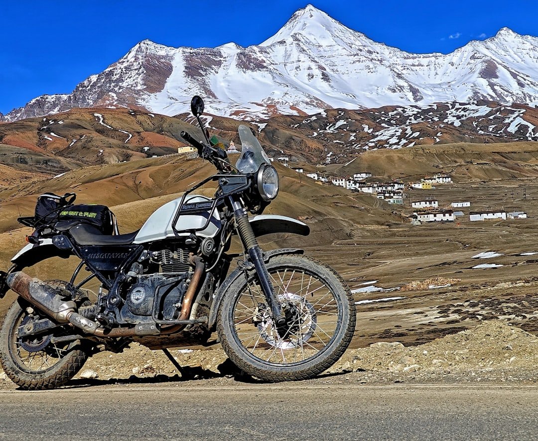 a motorcycle parked on the side of a road