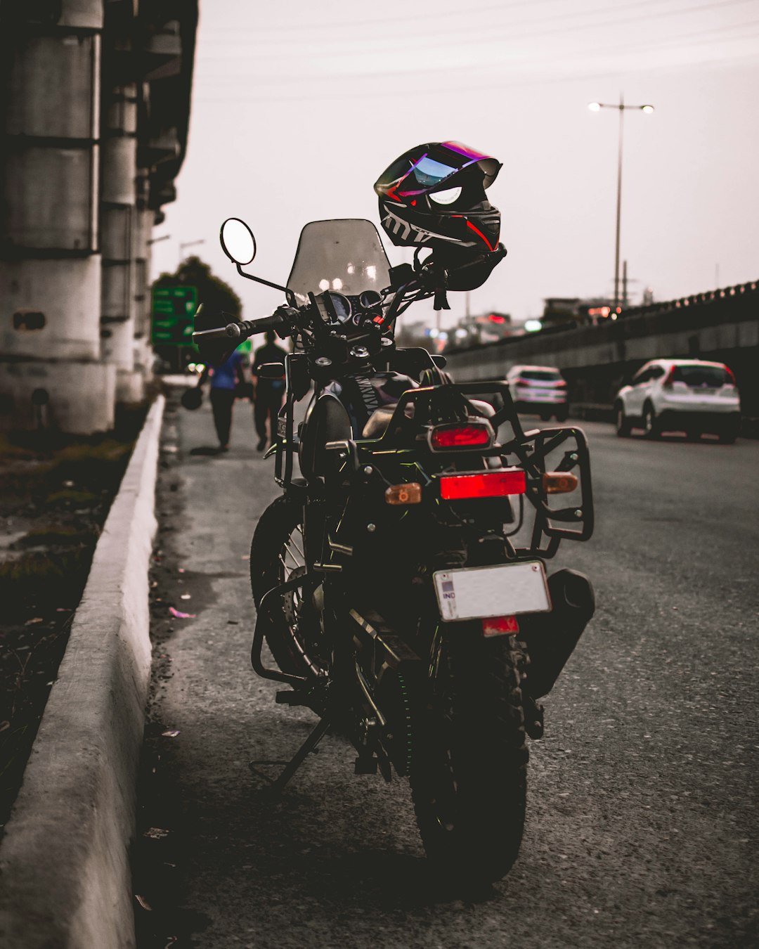 a motorcycle parked on the side of the road