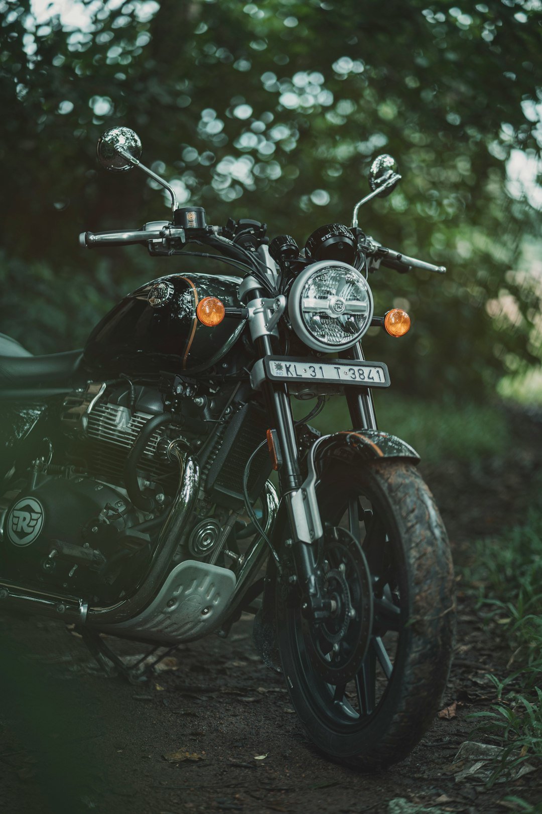 A motorcycle parked on the side of a road