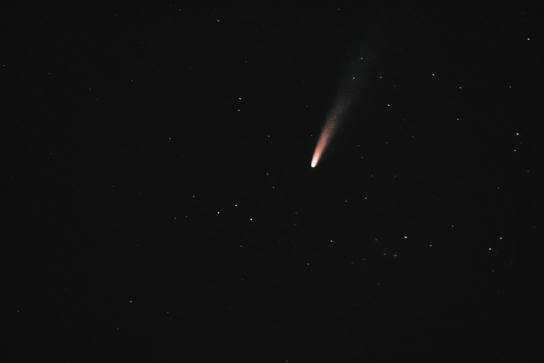 red light in dark night sky