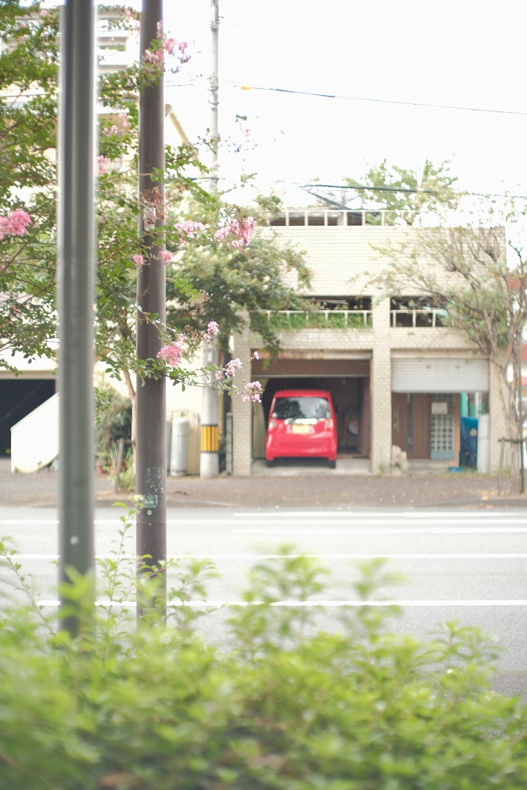 a red truck parked on the side of a road