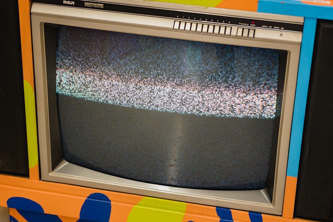 an old television sitting on top of a table