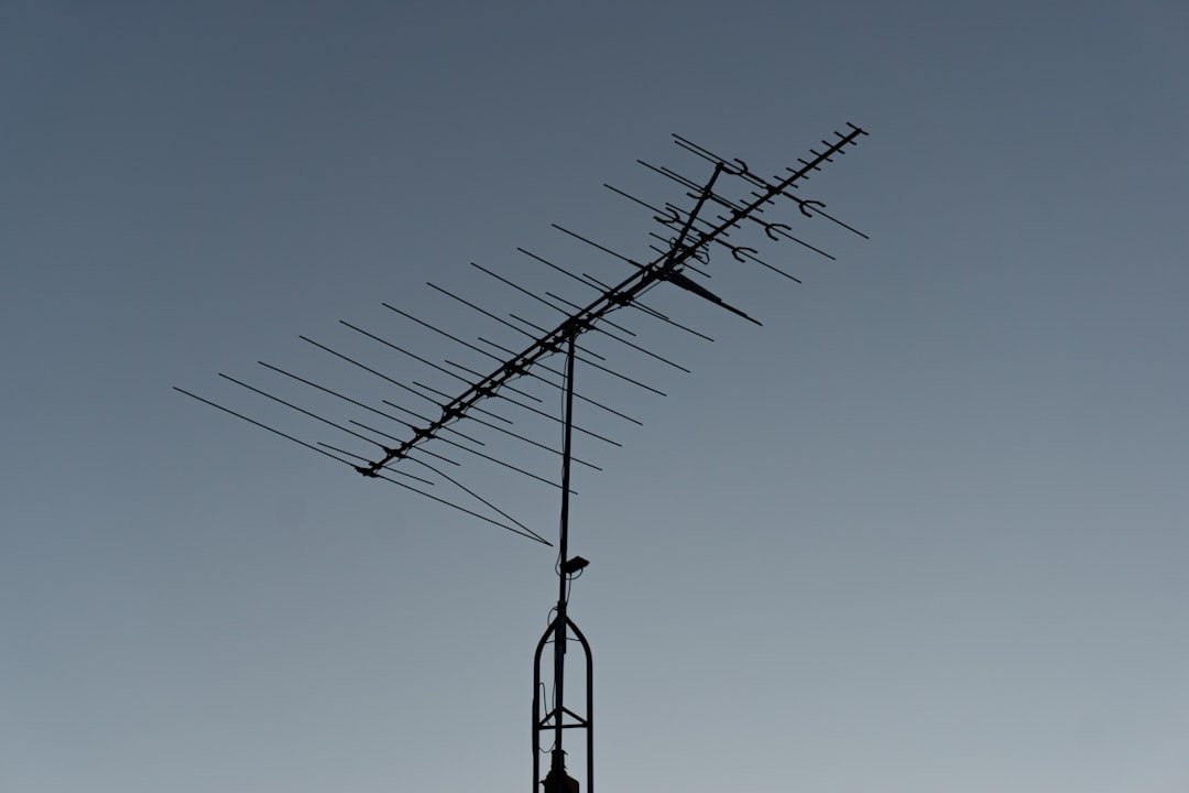 grayscale photography of outdoor antenna