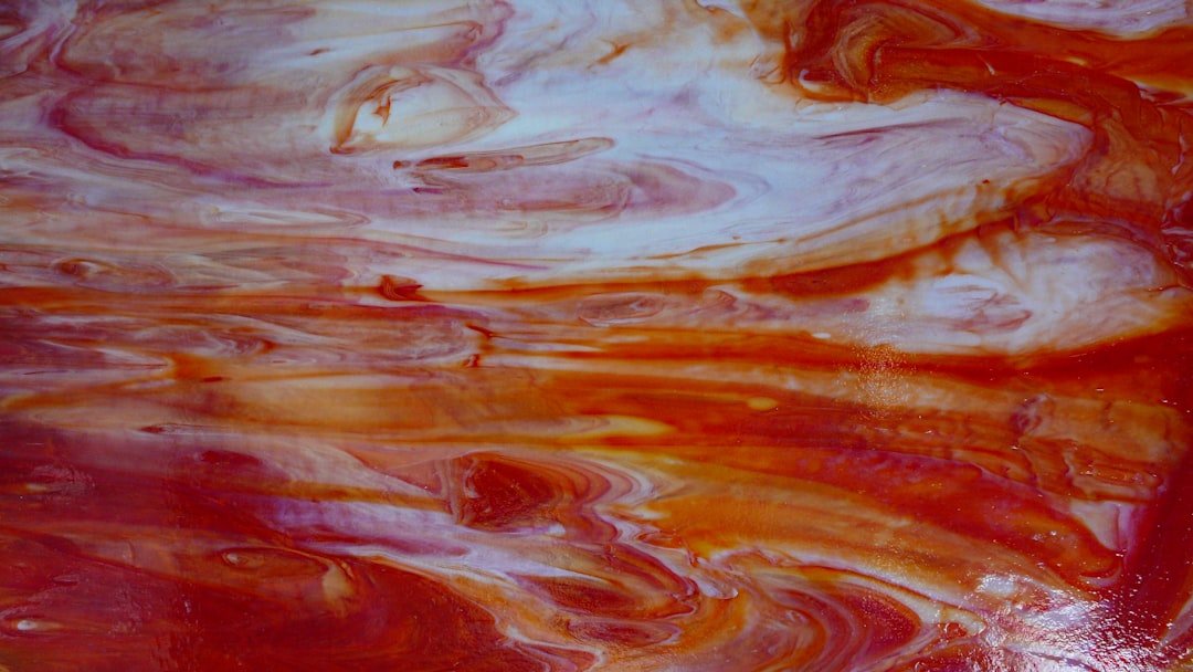 white and orange abstract painting