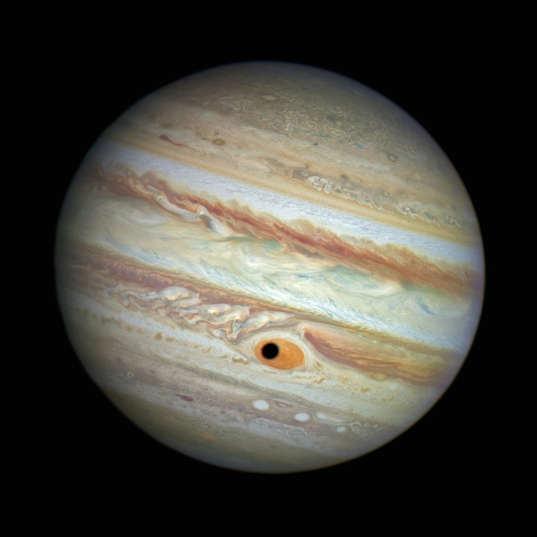 a very large planet with a black background