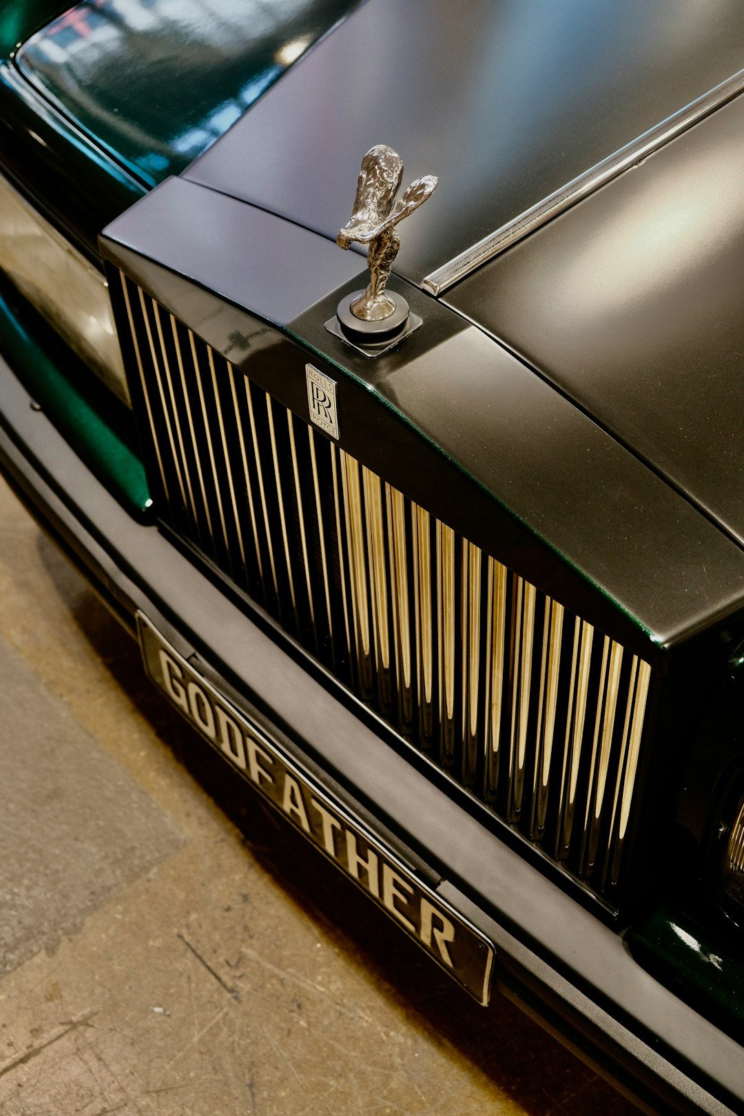 A close up of the front of a black car