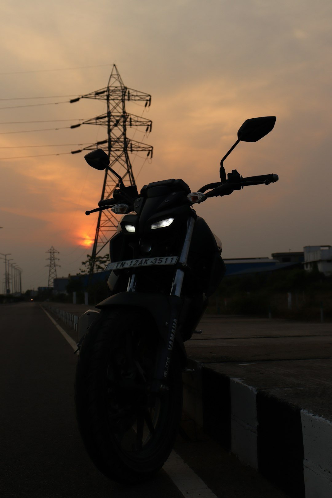 a motorcycle parked on the side of a road
