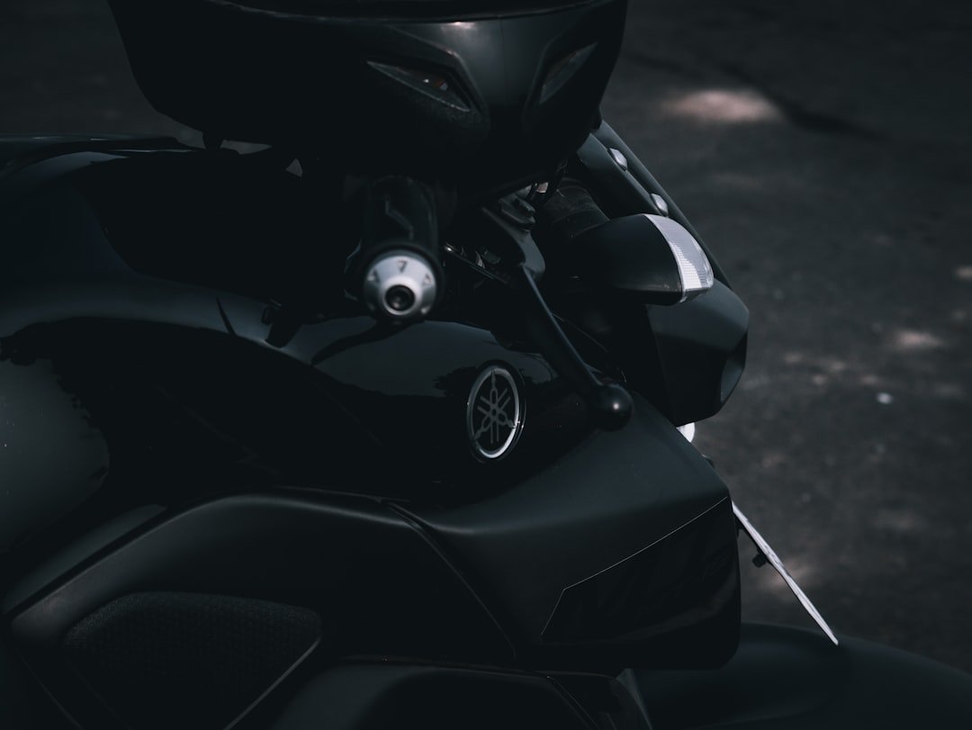 a close up of a motorcycle with a helmet on