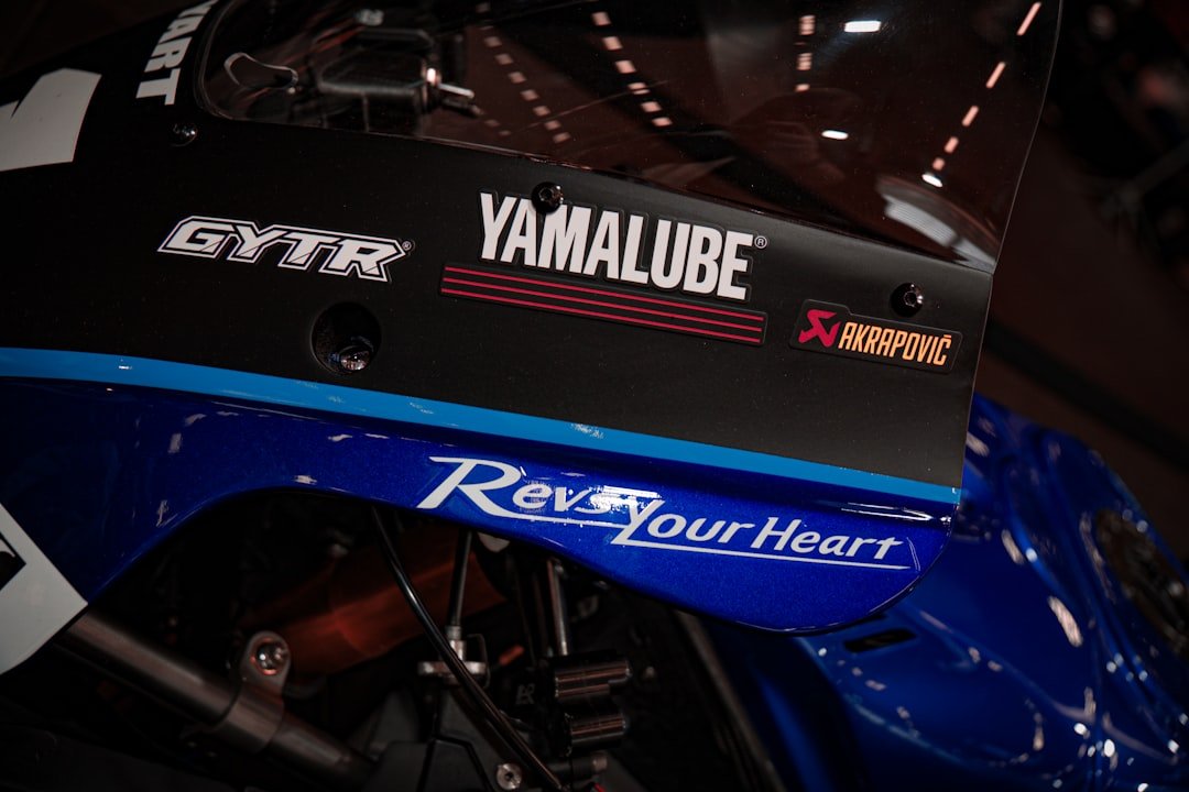Close-up of a yamaha motorcycle with branding.