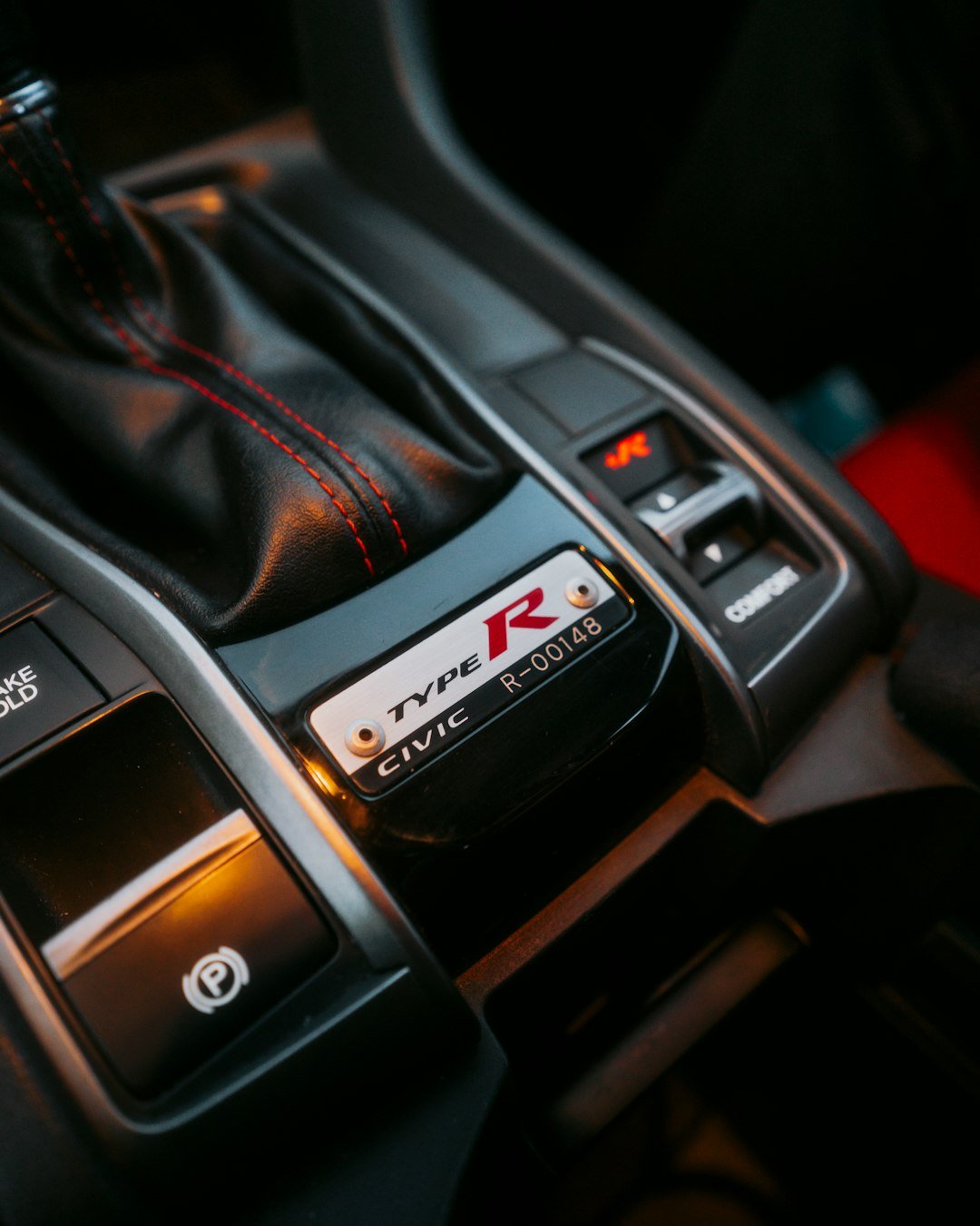 A close up of a car's gear box
